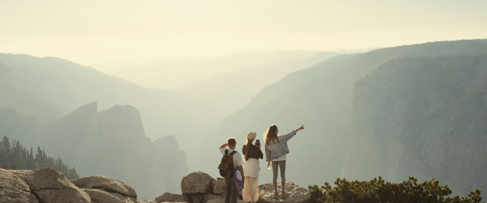 Group admiring scenic mountain valley view