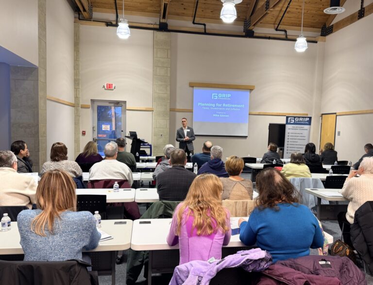 People attending a tax strategy and retirement planning workshop.